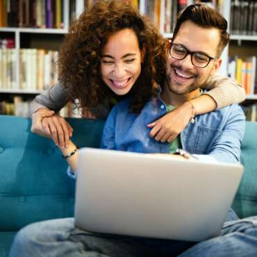 Students are studying together in library. Couple, study, technology, education love concept